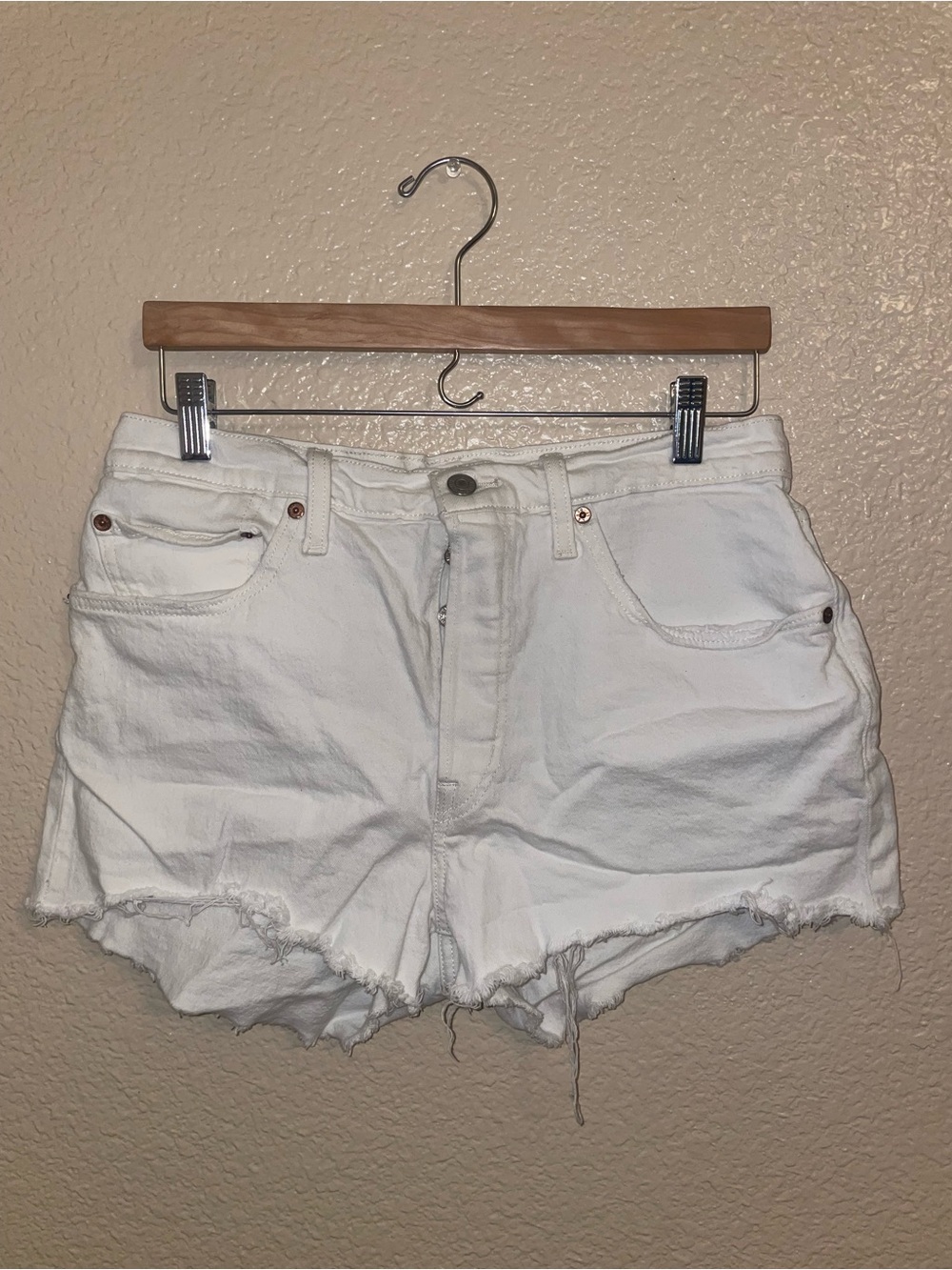 Levi's White Denim Frayed Cutoff Shorts